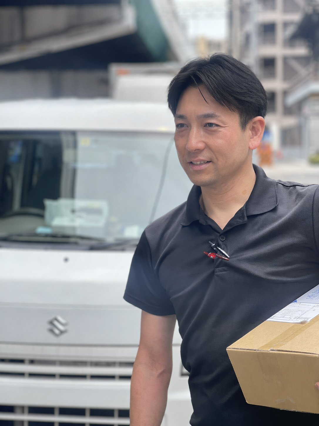 配送中の軽バン